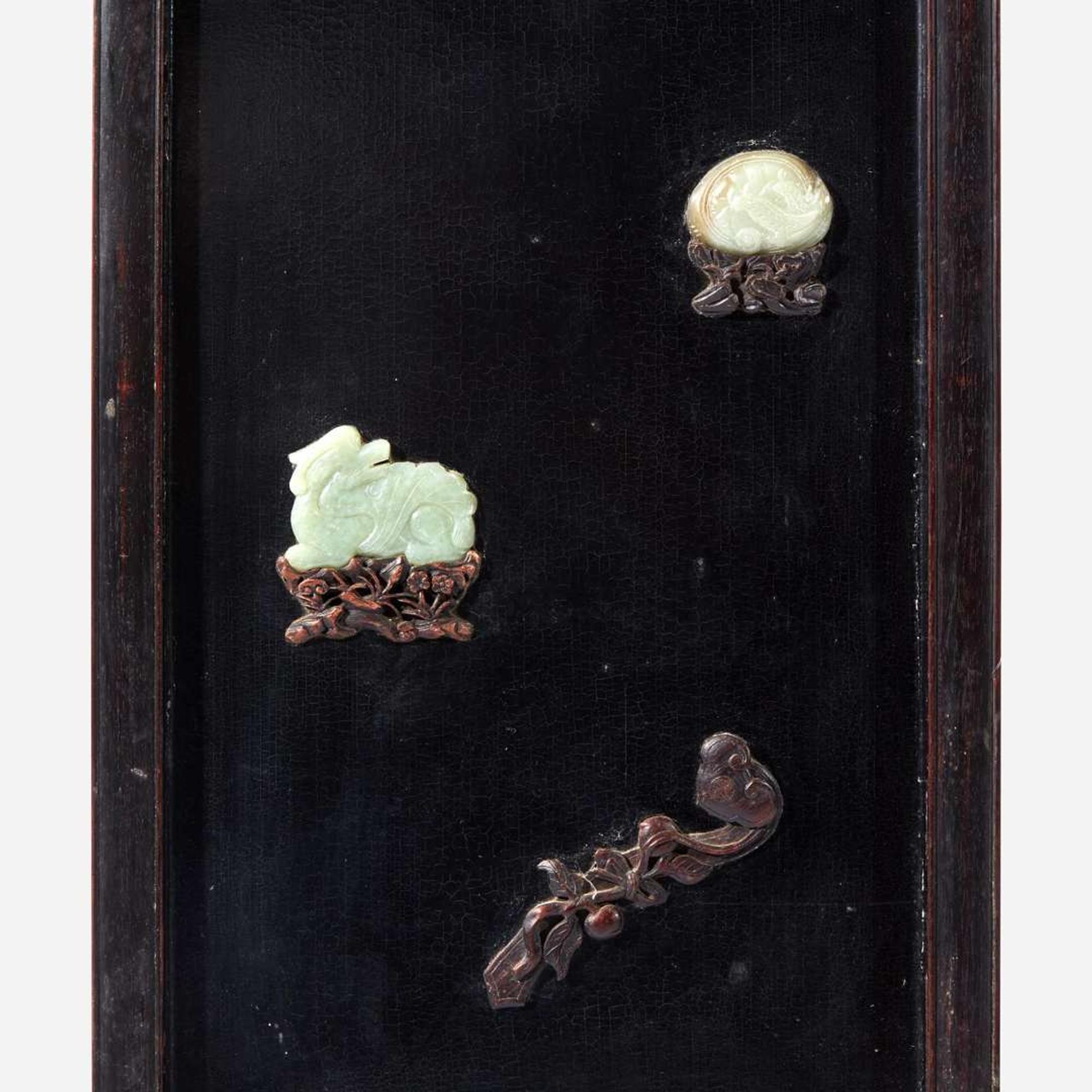 A pair of Chinese jade and hardstone embellished wood panels