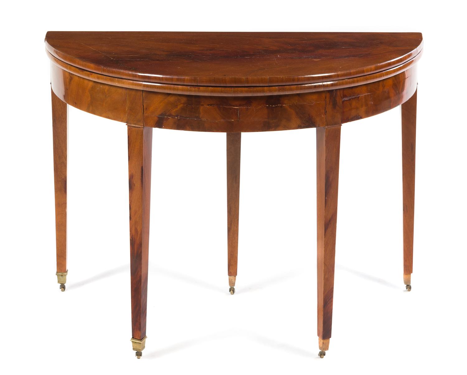 A George III Mahogany Flip-Top Table Height 29 1/4 x width 39 1/4 x depth 19 1/2 inches (closed).