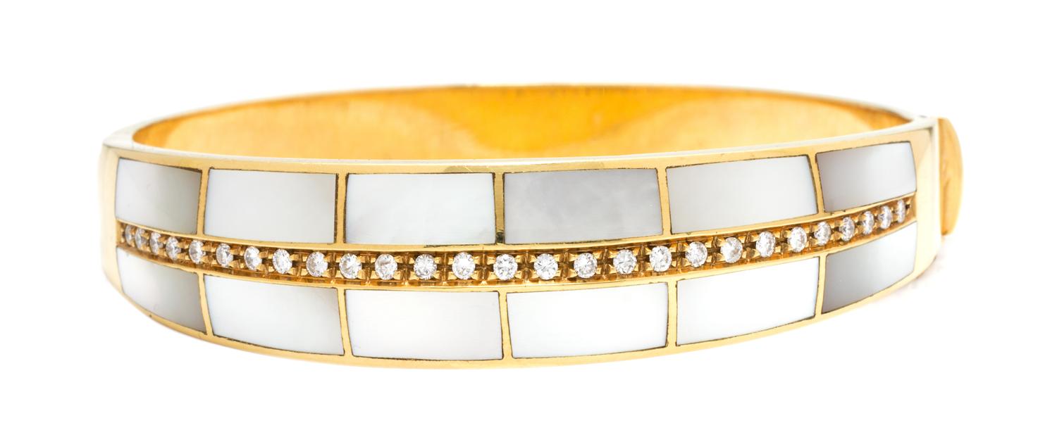 An 18 Karat Yellow Gold, Mother-of-Pearl and Diamond Bangle Bracelet, 21.50 dwts.