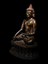 A Large Nepalese Gilt Bronze Figure of Seated Buddha