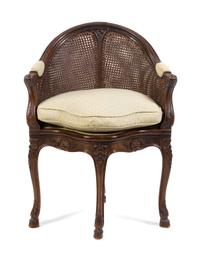 A Regence Style Beechwood Fauteuil de Bureau Height 34 1/2 inches. — LATE 19TH CENTURY