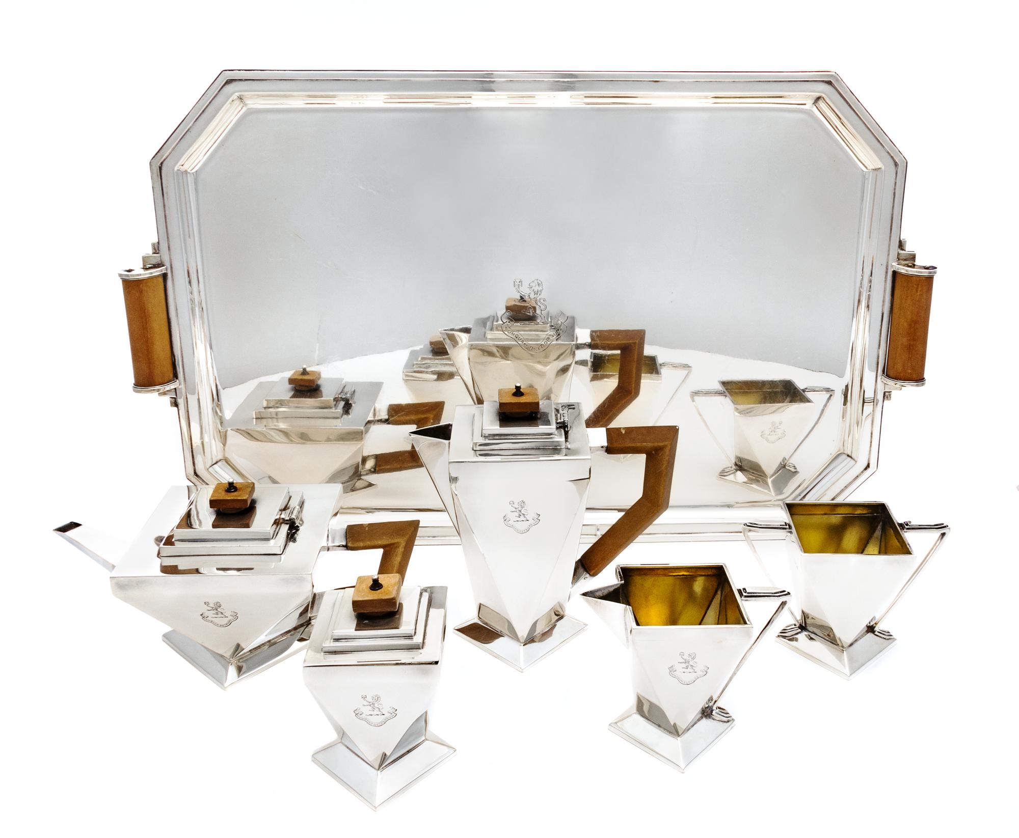An English Art Deco Silver Six-Piece Tea and Coffee Service, Charles Boyton & Son, London, 1932, comprising a teapot, coffee pot, cream