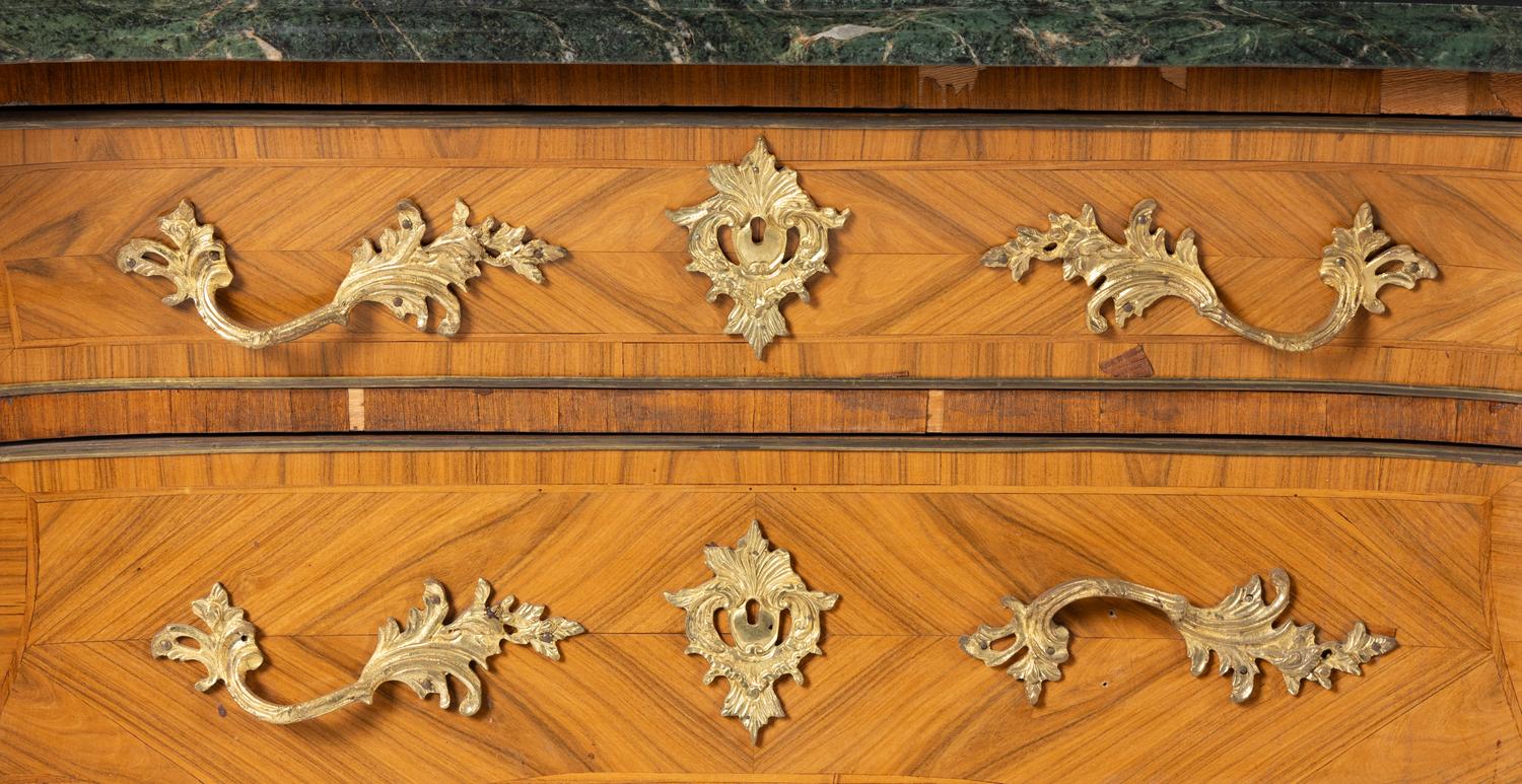 A Pair of Régence Style Gilt Bronze Mounted Tulipwood Marble-Top Commodes