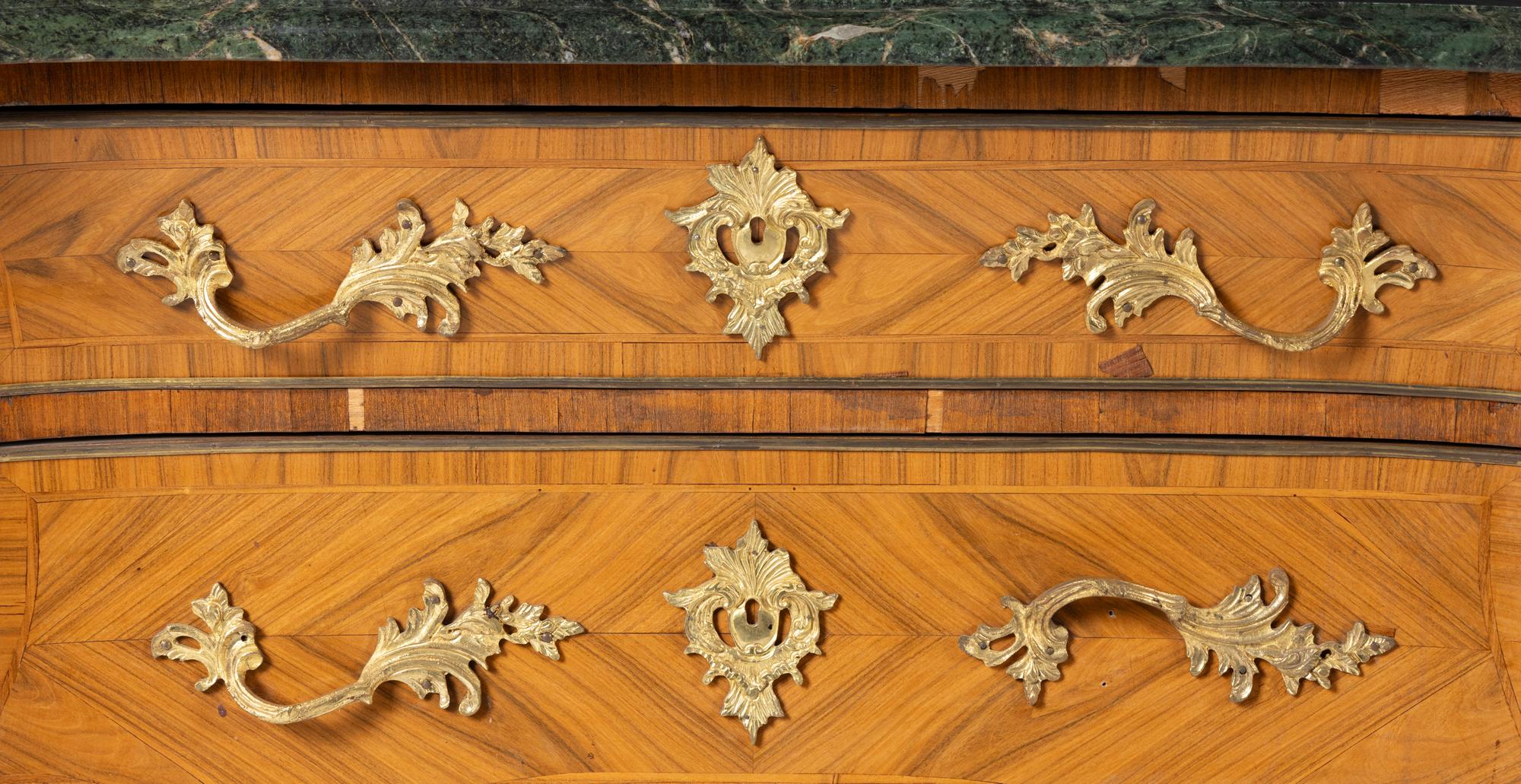 A Pair of Régence Style Gilt Bronze Mounted Tulipwood Marble-Top Commodes
