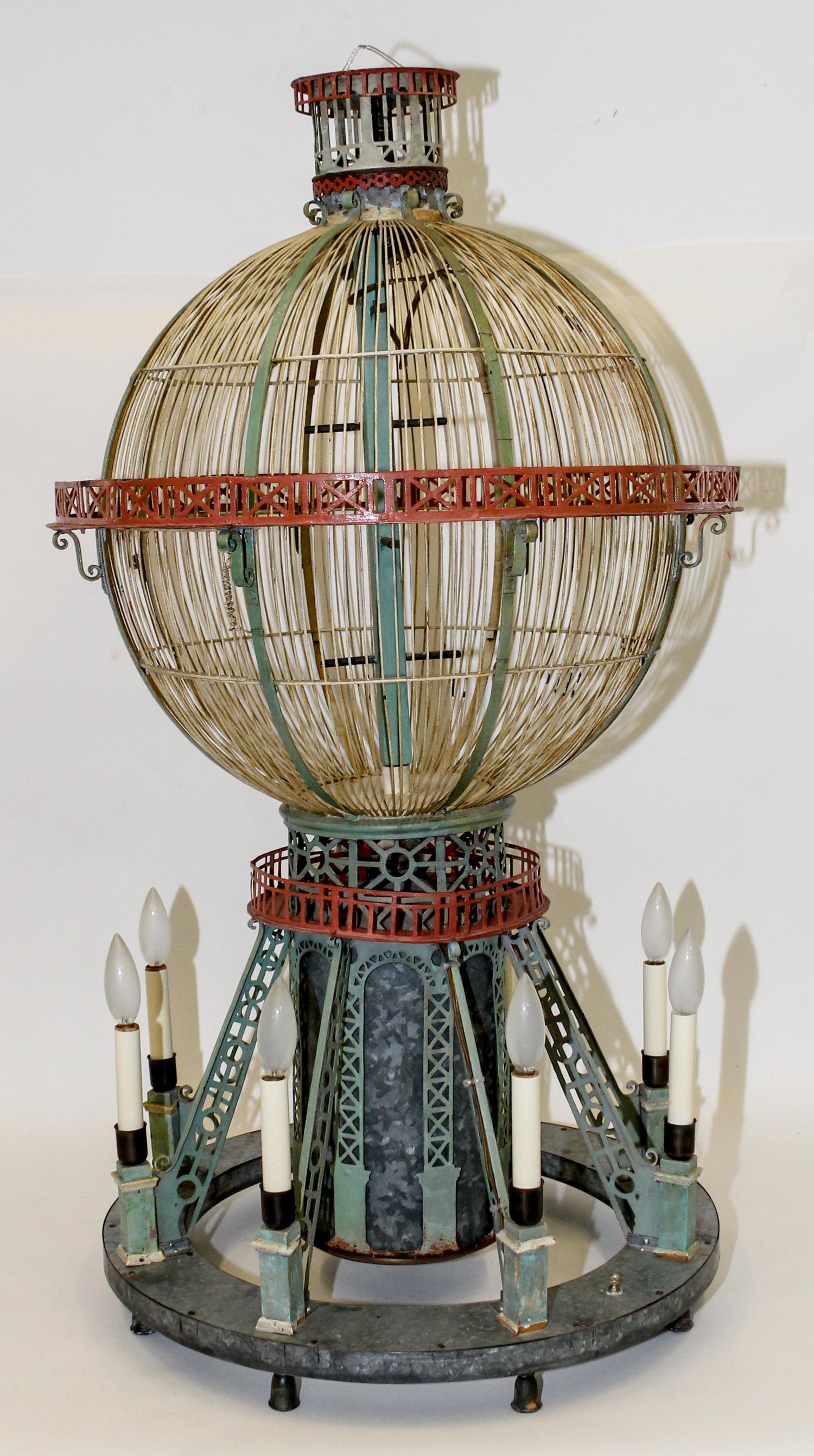 A Birdcage Form Chandelier. Height 42 inches.