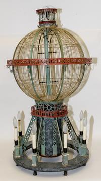 A Birdcage Form Chandelier. Height 42 inches.