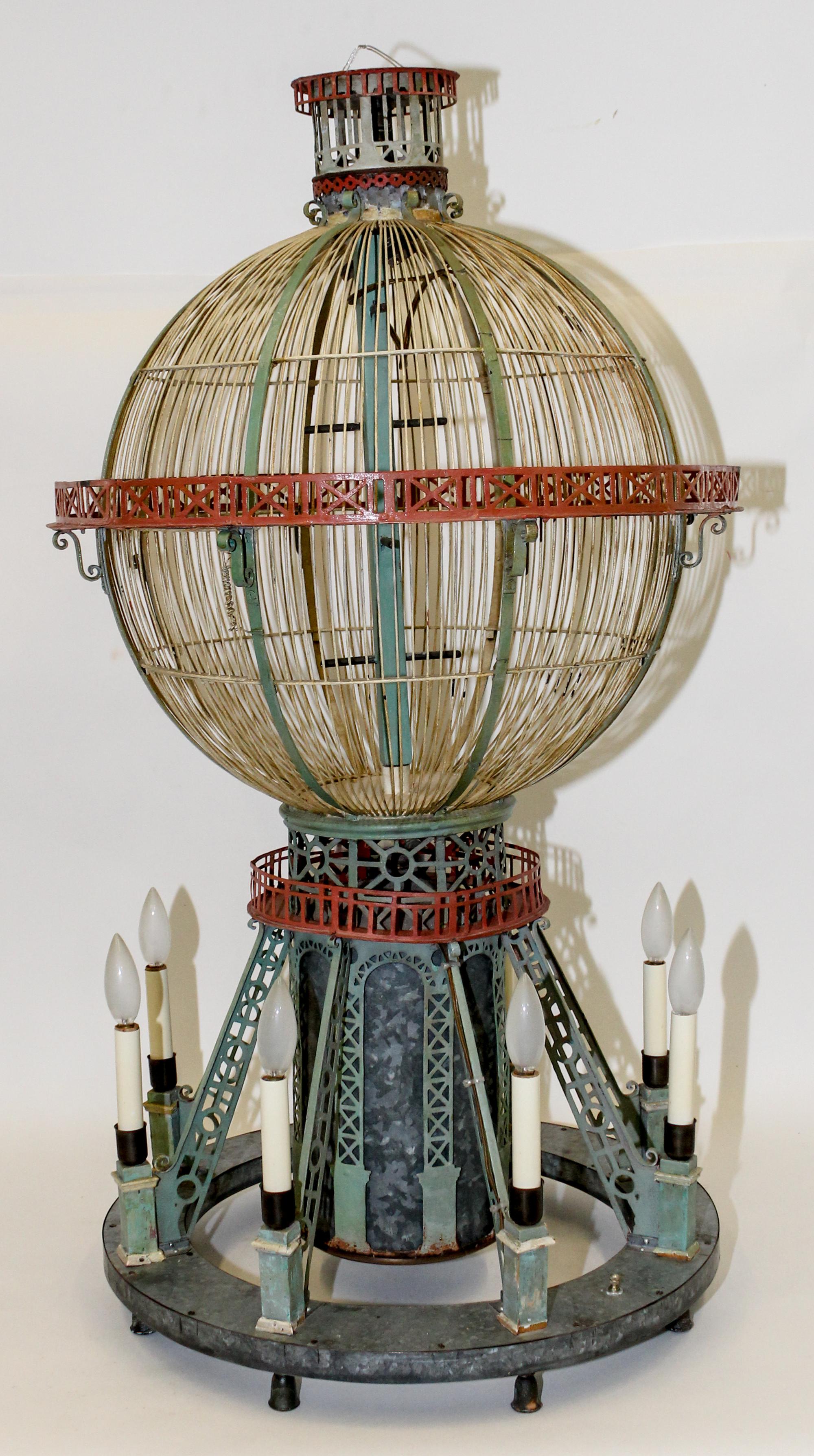 A Birdcage Form Chandelier. Height 42 inches.