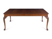 A Baker George II Style Walnut Dining Table