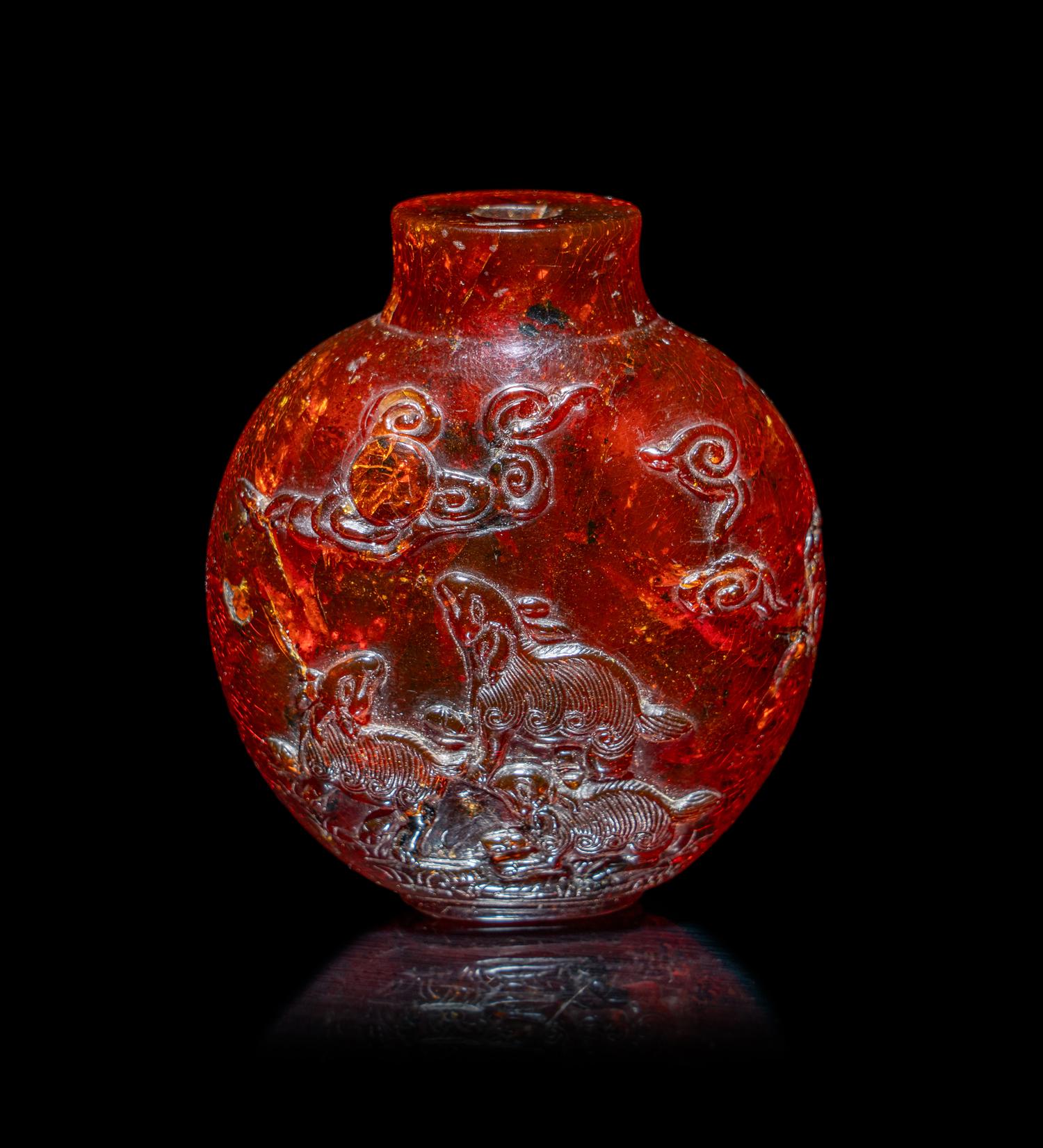 A Chinese Carved Amber Snuff Bottle