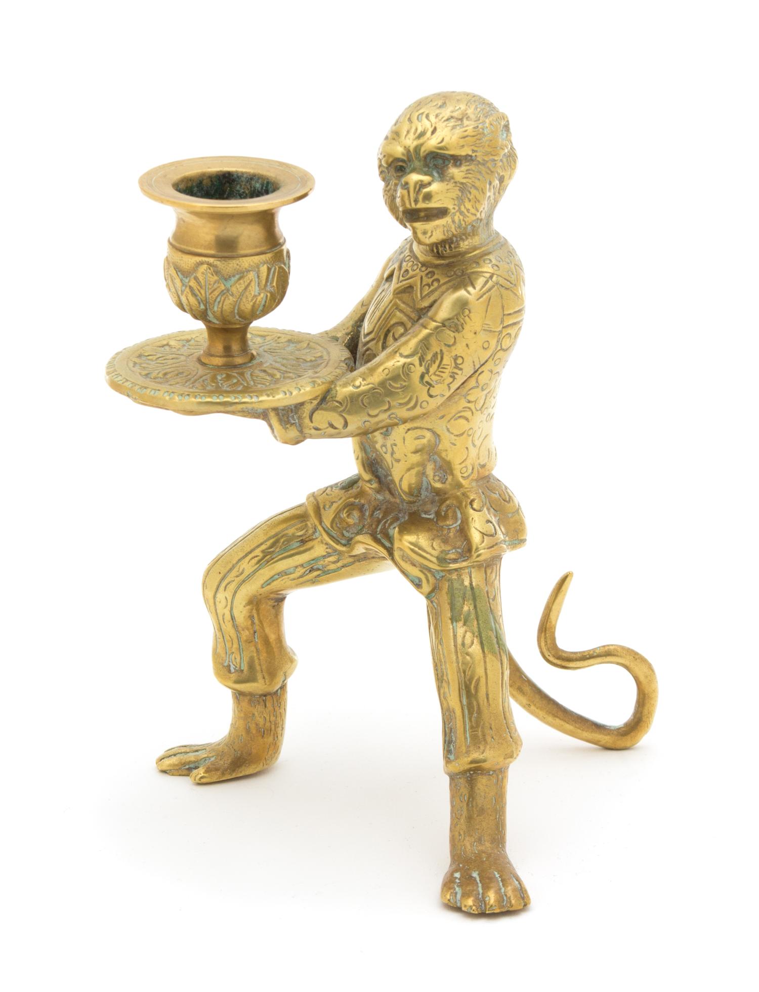 A Brass Monkey-Form Candlestick Height 6 1/2 inches. — 20TH CENTURY