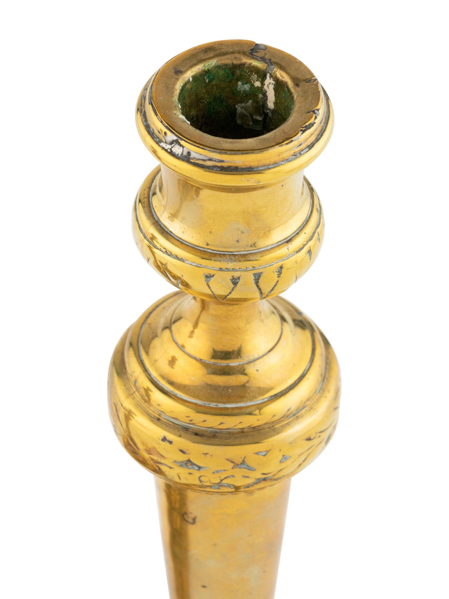 A Pair of Louis XV Brass Candlesticks