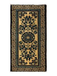 A Group of Four Chinese Rugs