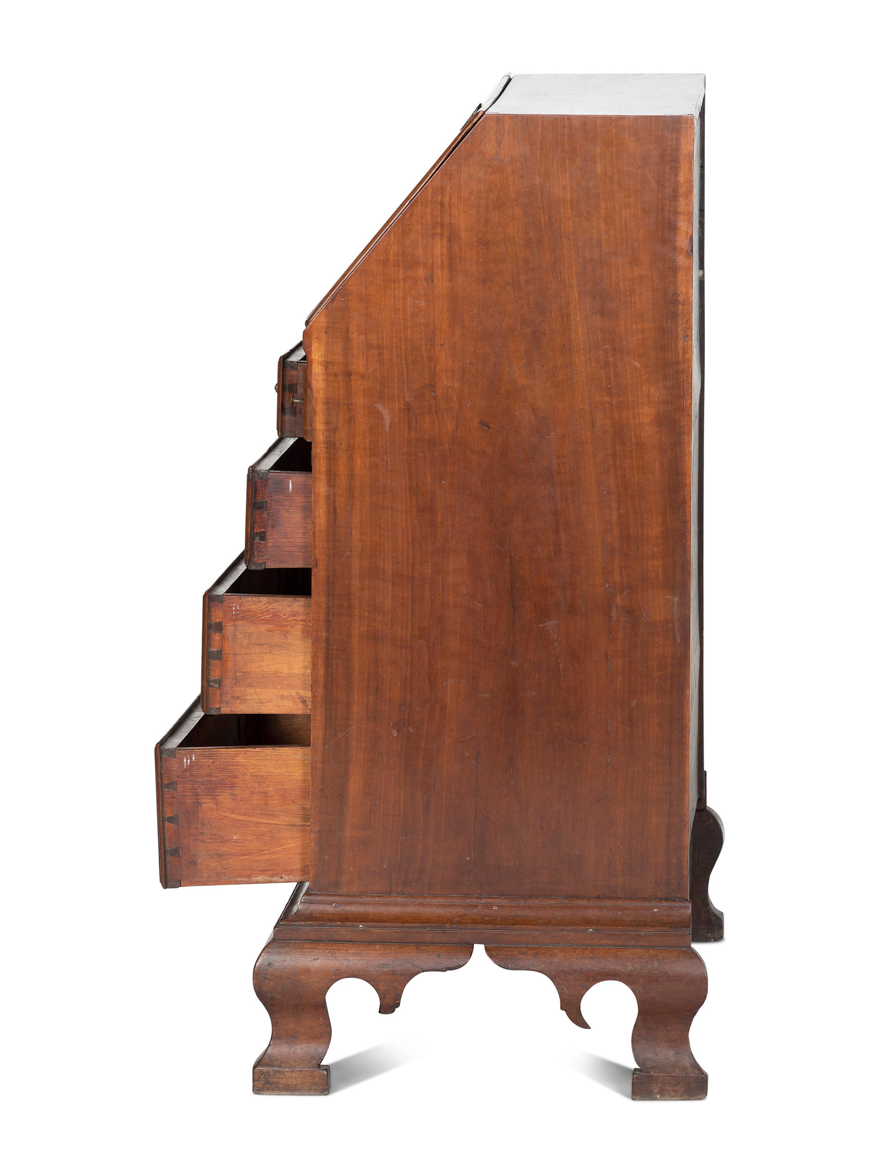 A Chippendale Carved Cherrywood Slant-Front Desk