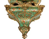 A Louis XV Green-Stained Horn and Gilt Bronze Mounted Cartel Clock and Bracket