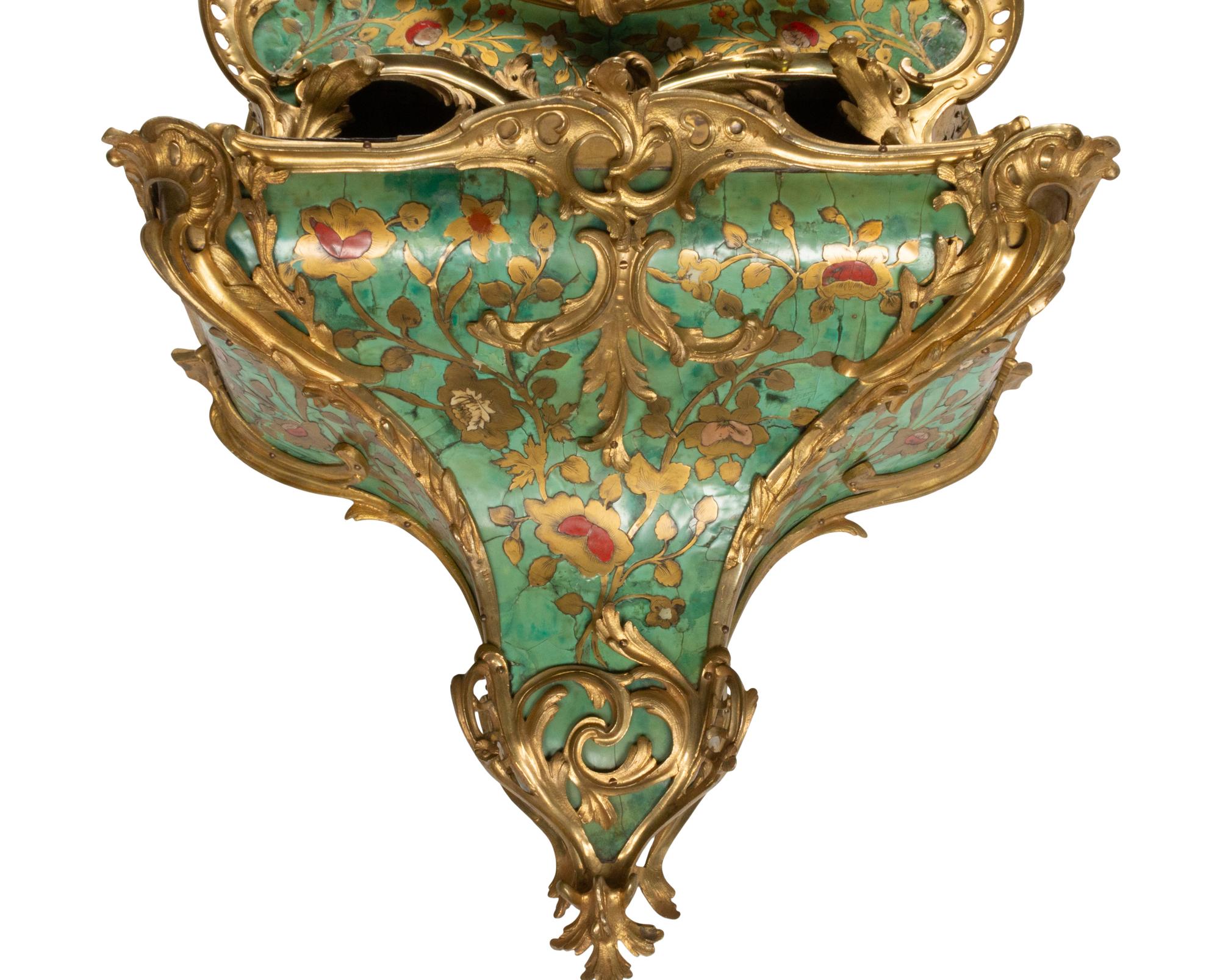 A Louis XV Green-Stained Horn and Gilt Bronze Mounted Cartel Clock and Bracket