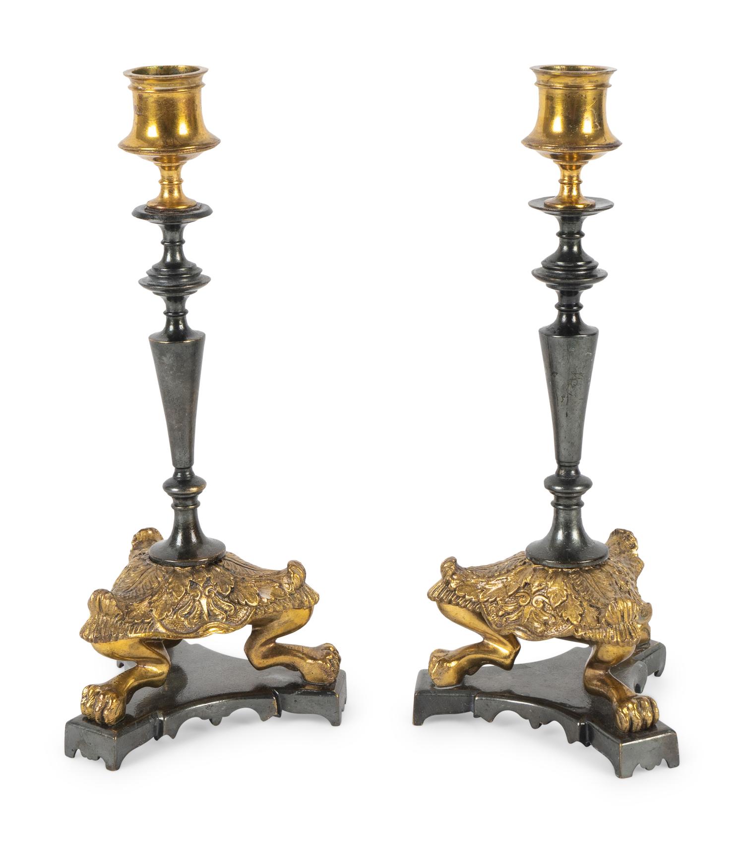 A Pair of French Empire Style Brass and Steel Candlesticks