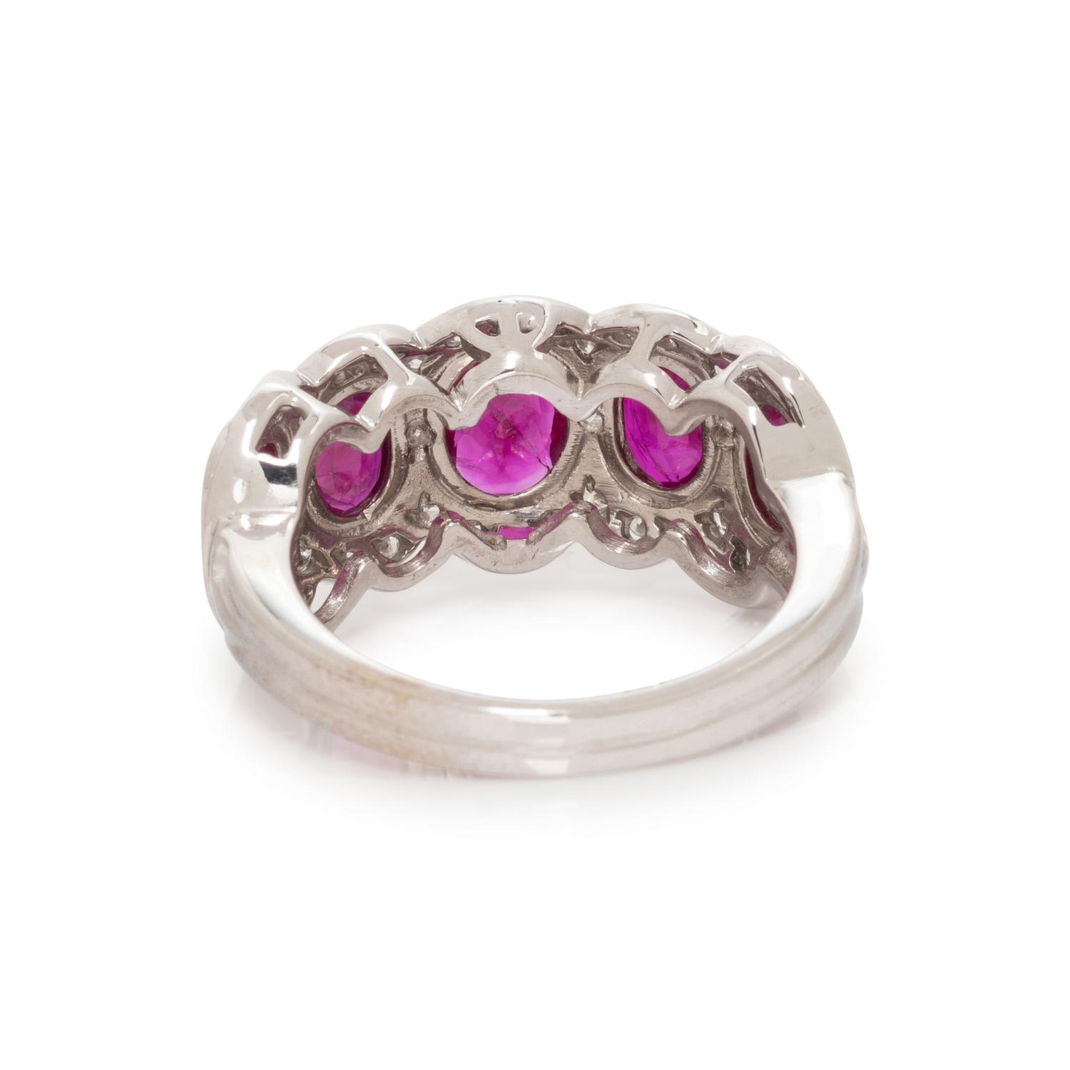 WHITE GOLD, SYNTHETIC RUBY AND DIAMOND RING