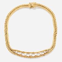 A gold and diamond necklace with matching bracelet Italy