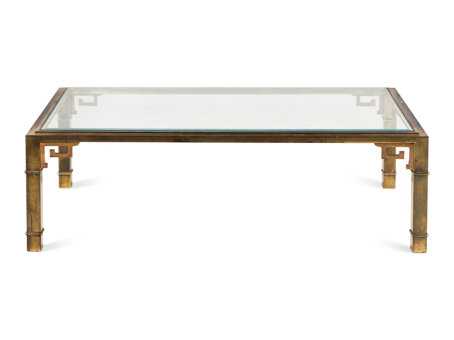 A Brass and Glass Cocktail Table