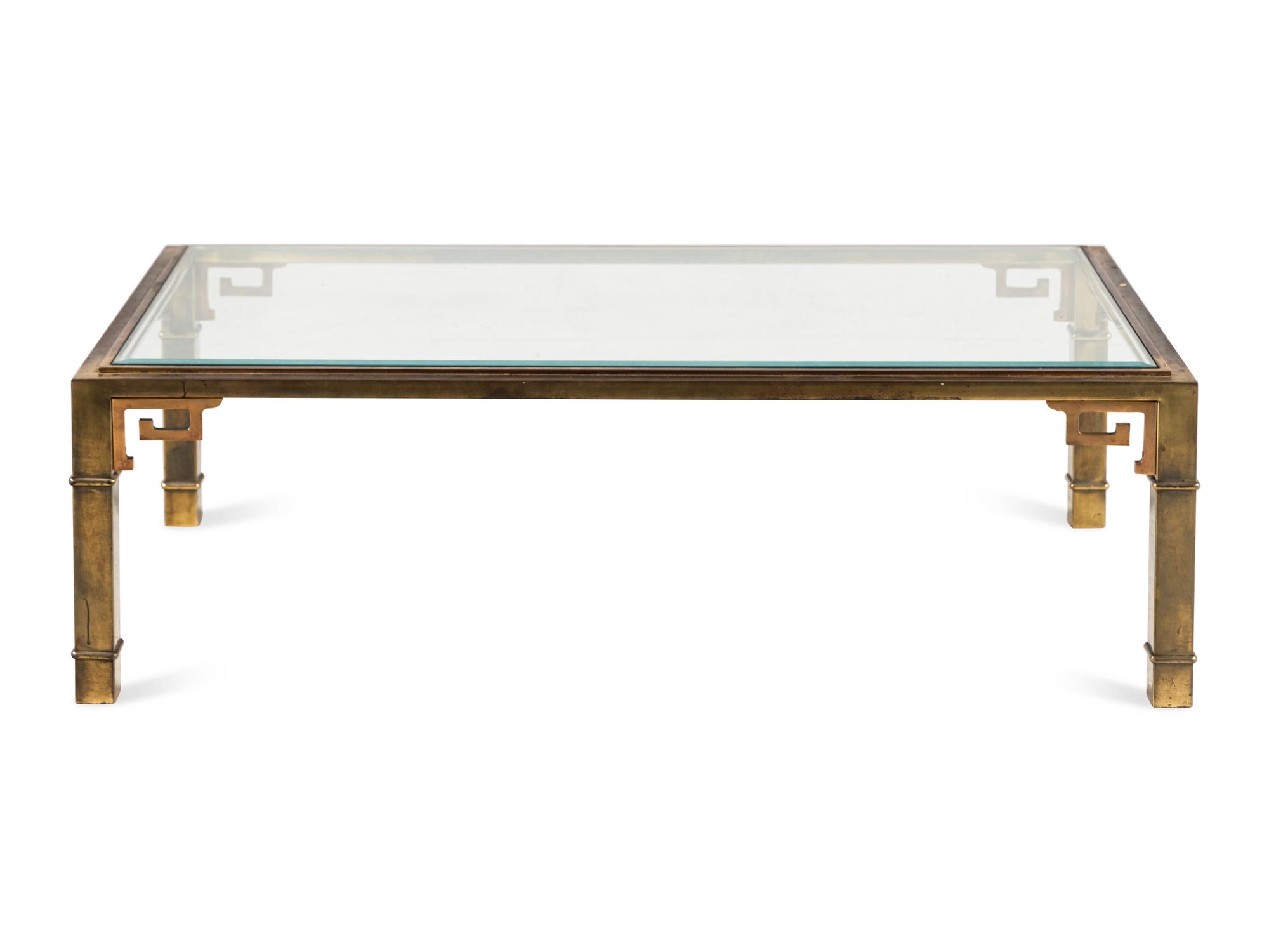 A Brass and Glass Cocktail Table