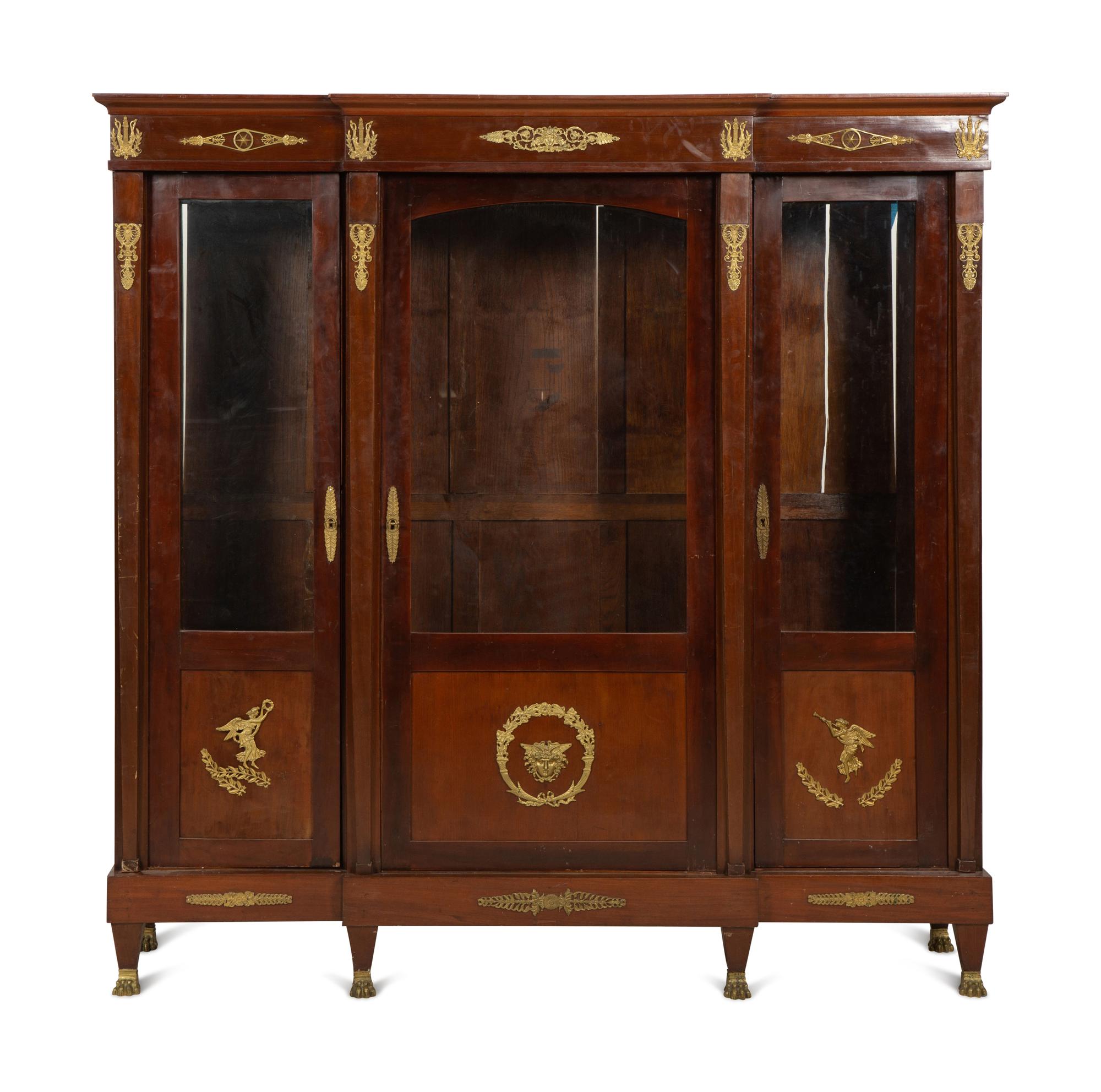 An Empire Style Gilt Metal Mounted Mahogany Bibliothèque