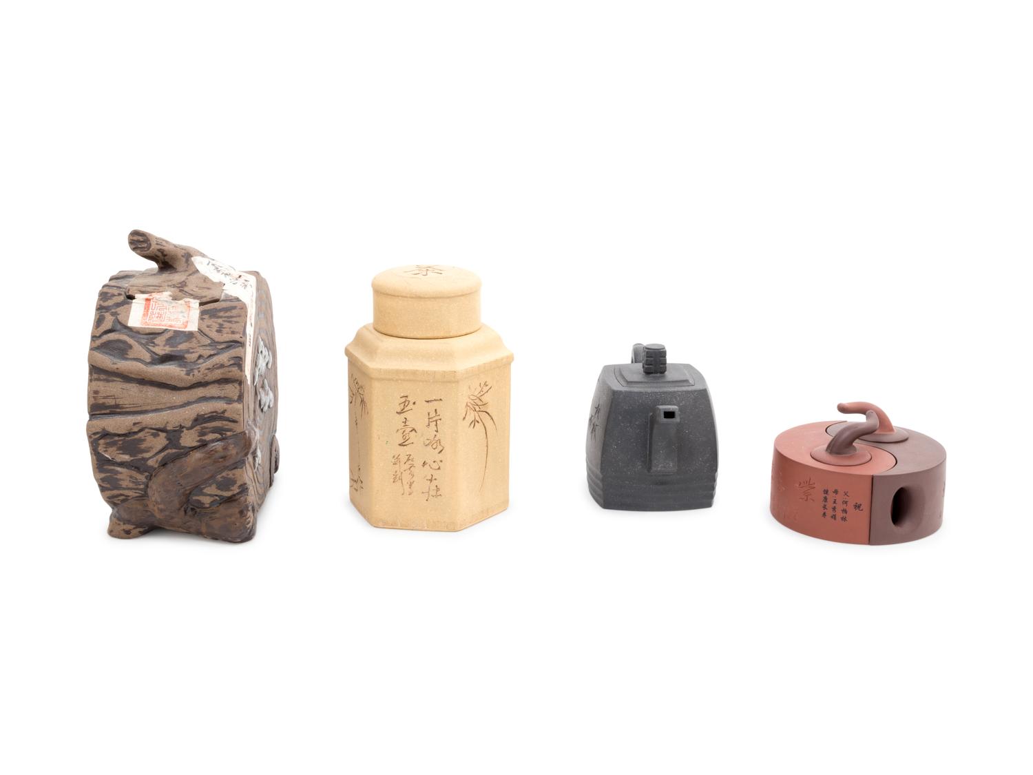 Four Chinese Yixing Pottery Teapots