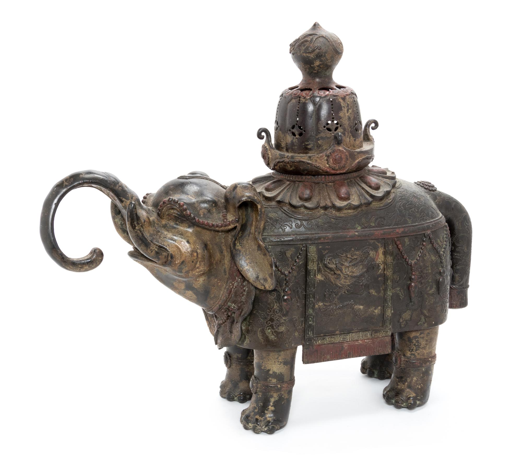 A Chinese Bronze Elephant-Form Censer Height 14 3/4 inches. — MING DYNASTY (1368-1644)