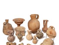 A Group of 19 Holy Land Terracotta Oil Lamps, Pottery, and Bronze Blades