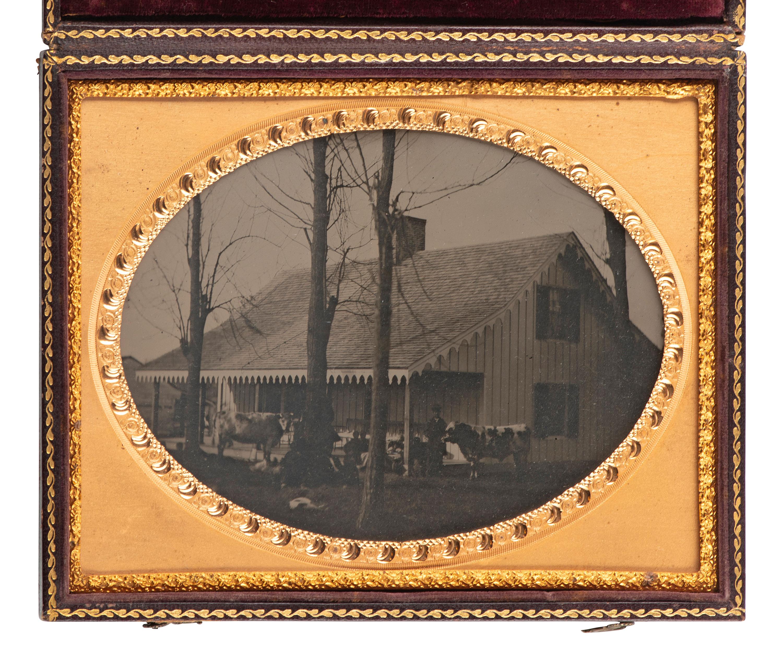 [EARLY PHOTOGRAPHY - AFRICAN AMERICANA]. Half plate ambrotype of an African American family at a farm.