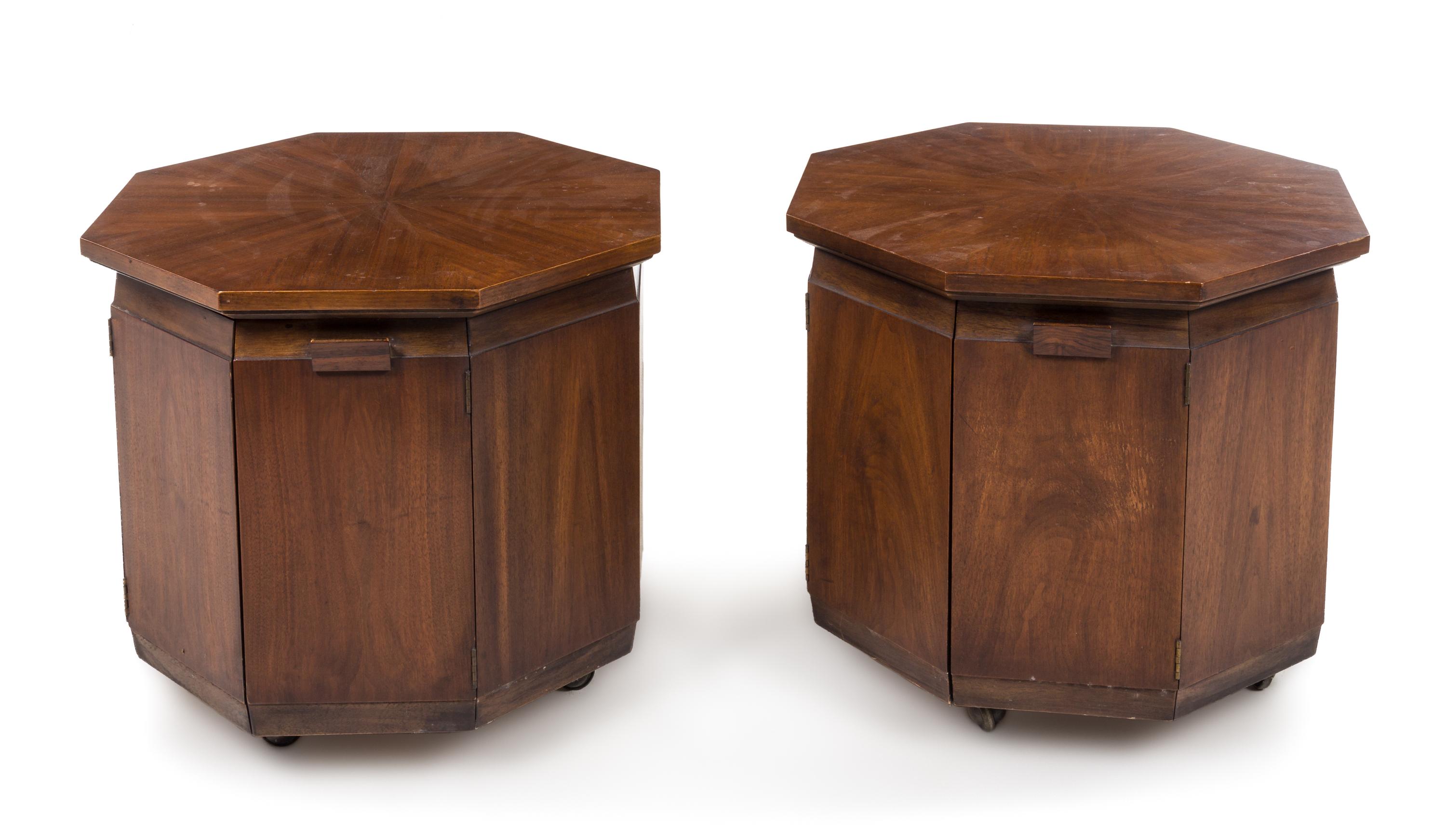 American, c. 1960, a pair of Arts and Crafts style octagonal occasional tables/cabinets, on casters