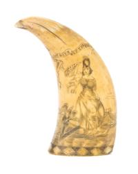 An American Scrimshaw Whale's Tooth, Length 5 1/4 inches.