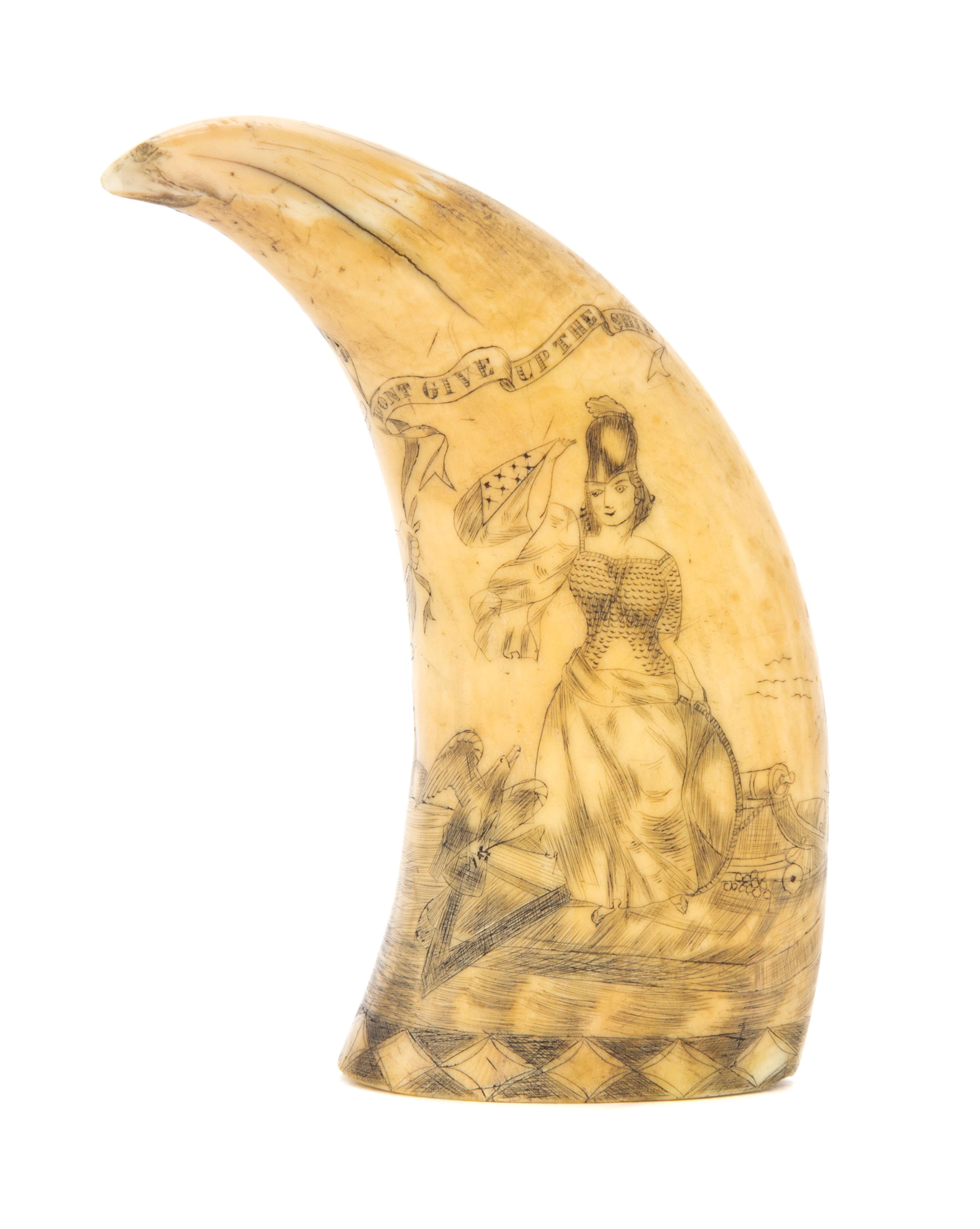 An American Scrimshaw Whale's Tooth, Length 5 1/4 inches.