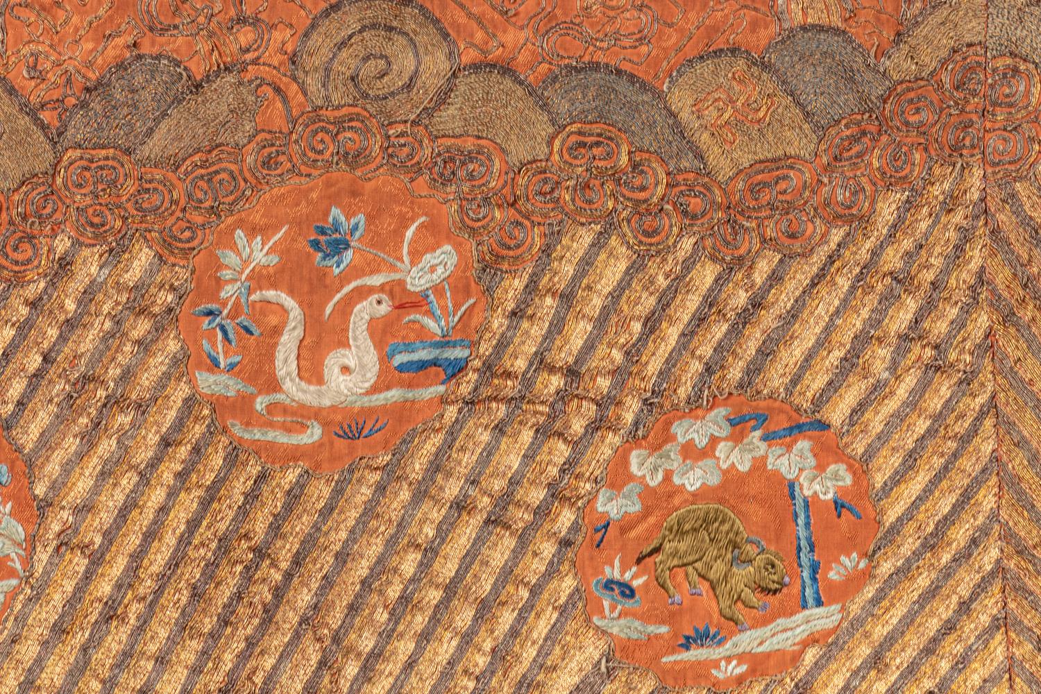 An Apricot Ground Embroidered Silk Lady’s Informal Robe