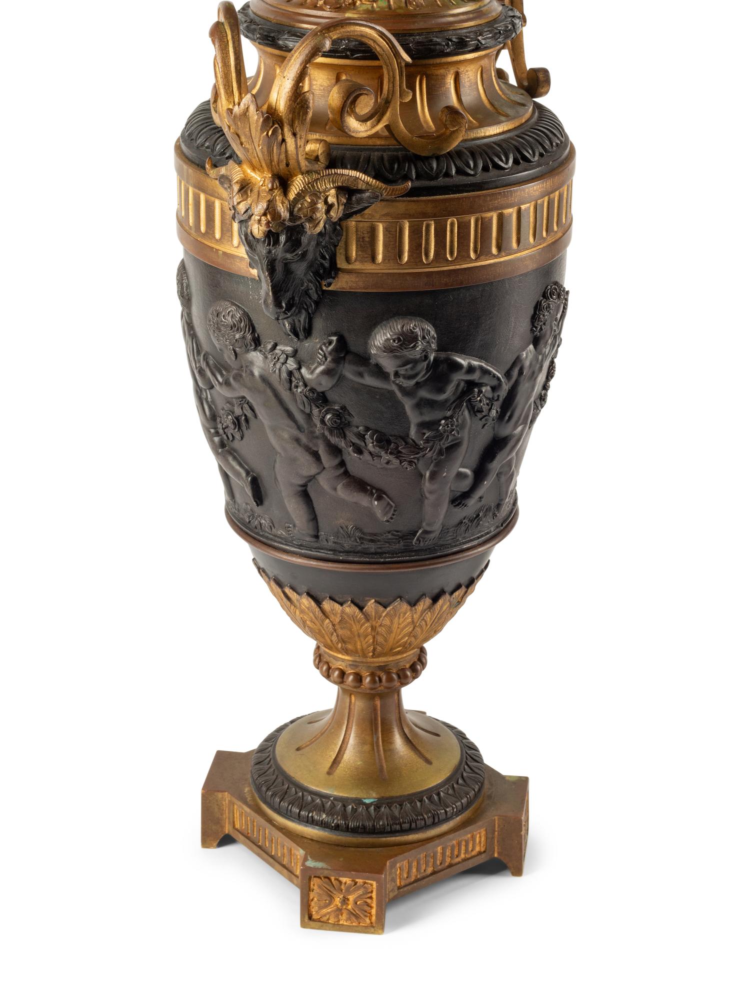 A Pair of Napoleon III Gilt and Patinated Bronze Candelabra