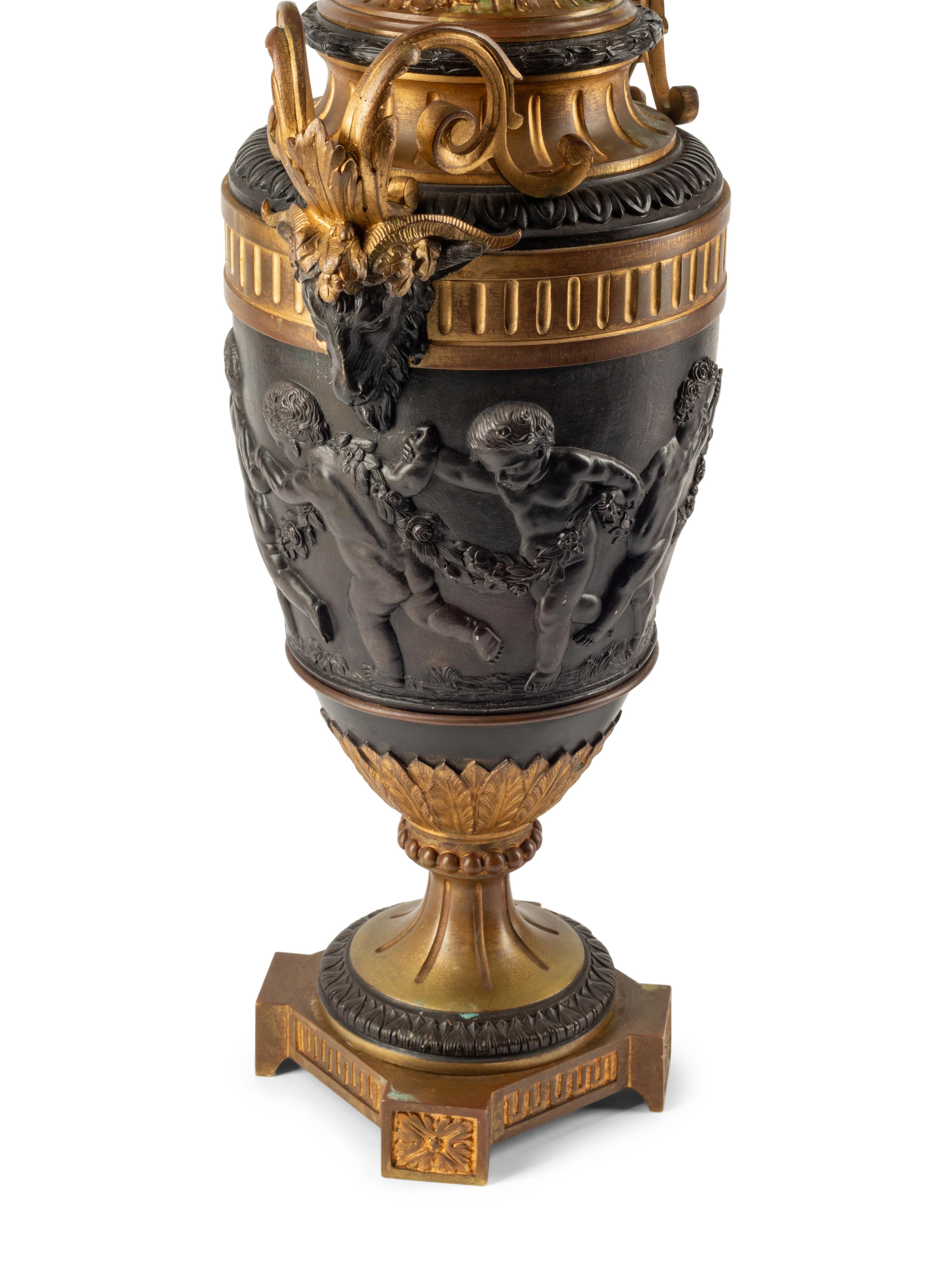 A Pair of Napoleon III Gilt and Patinated Bronze Candelabra