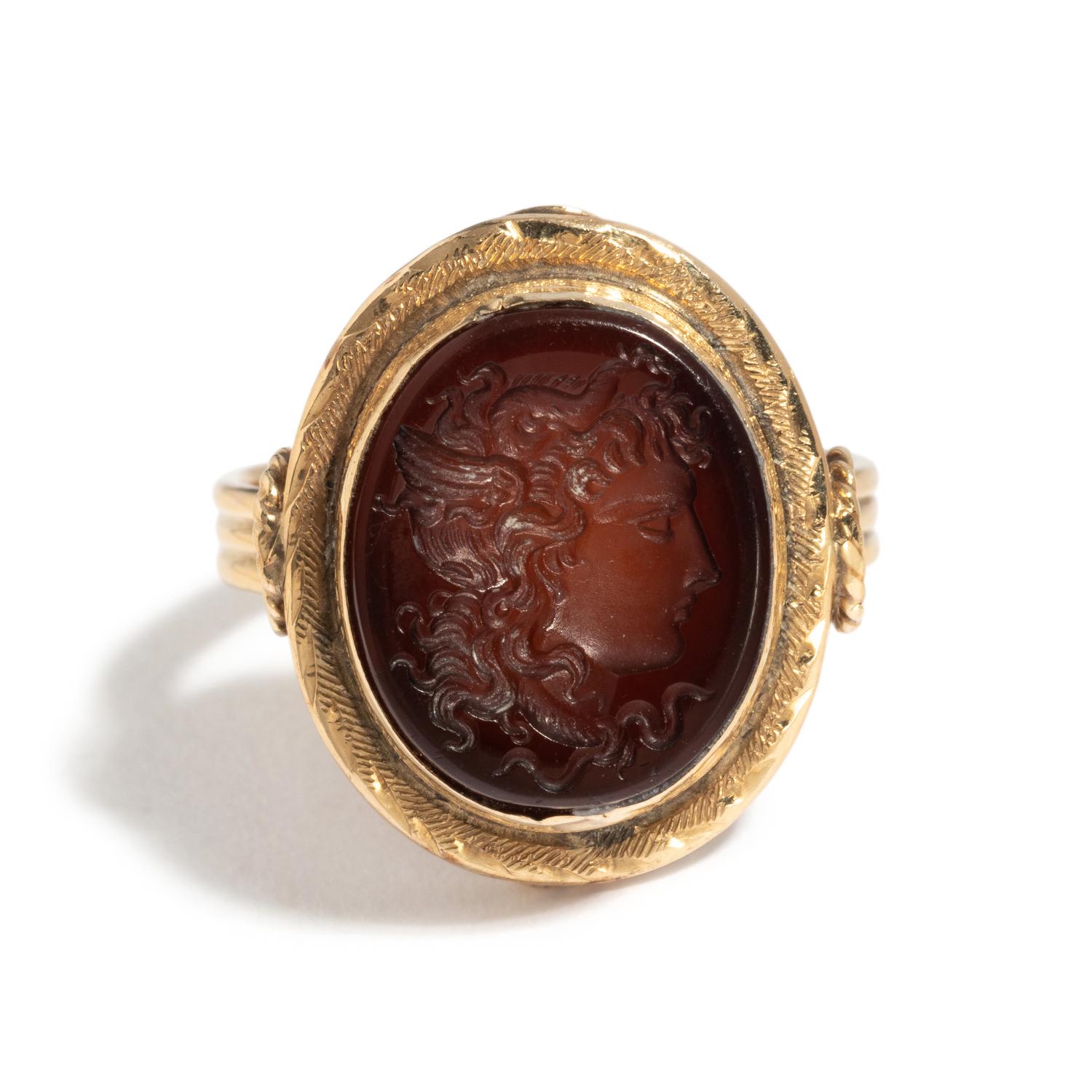 A Neoclassical Gold and Carnelian Finger Ring with a Head of Medusa