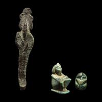 An Egyptian Bronze Osiris, an Egyptian Faience Shu, and an Egyptian Faience Scarab