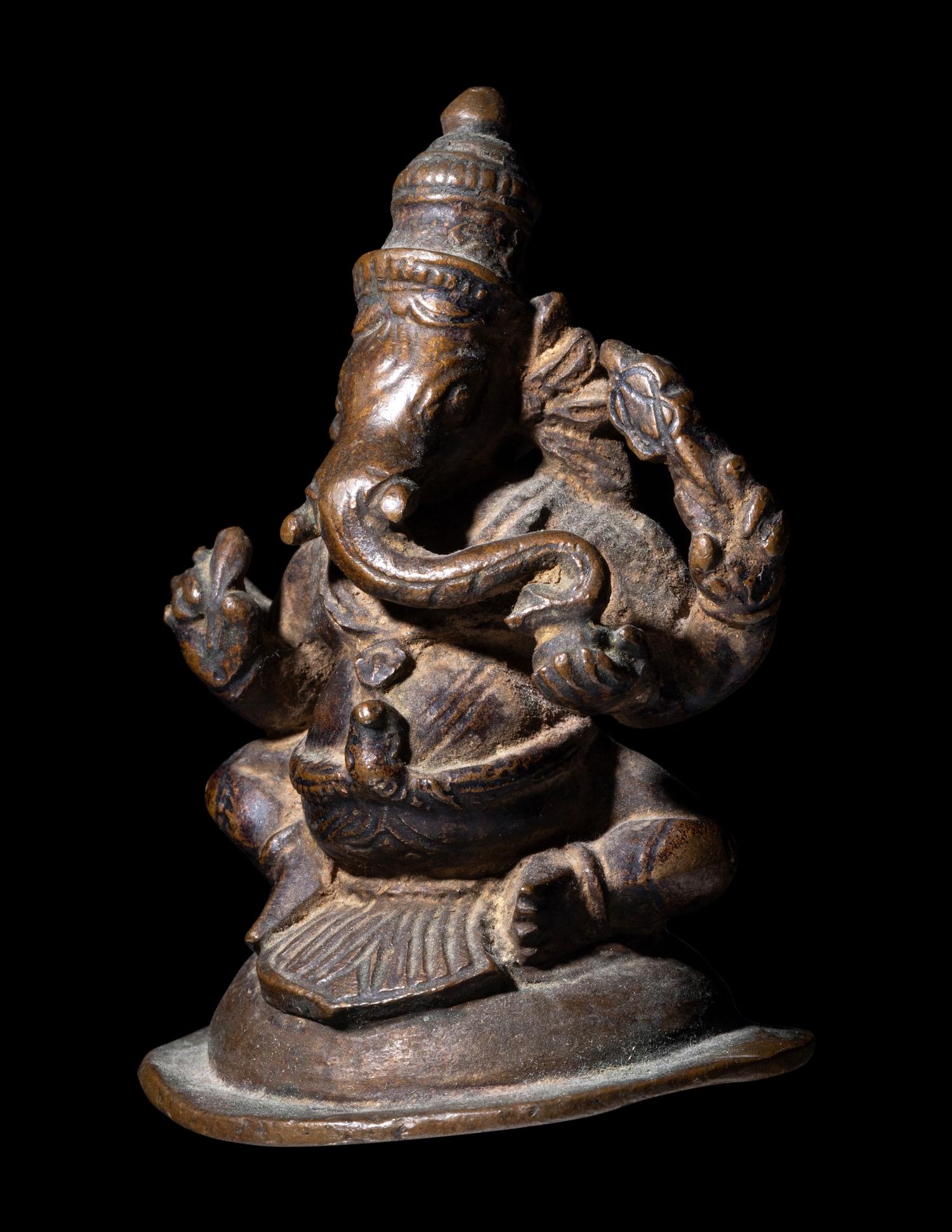 An Indian Bronze Figure of Ganesha