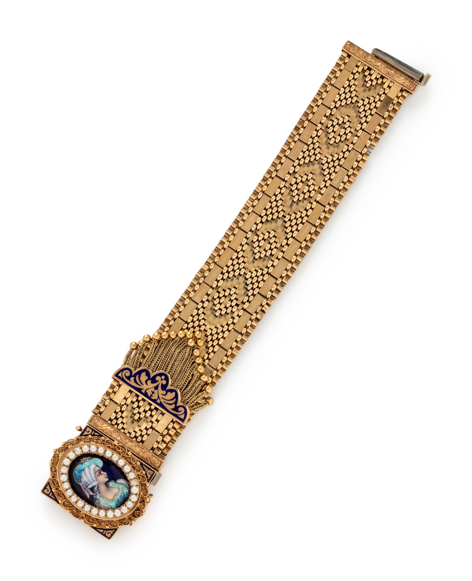 YELLOW GOLD, ENAMEL, AND SEED PEARL SURPRISE WATCH