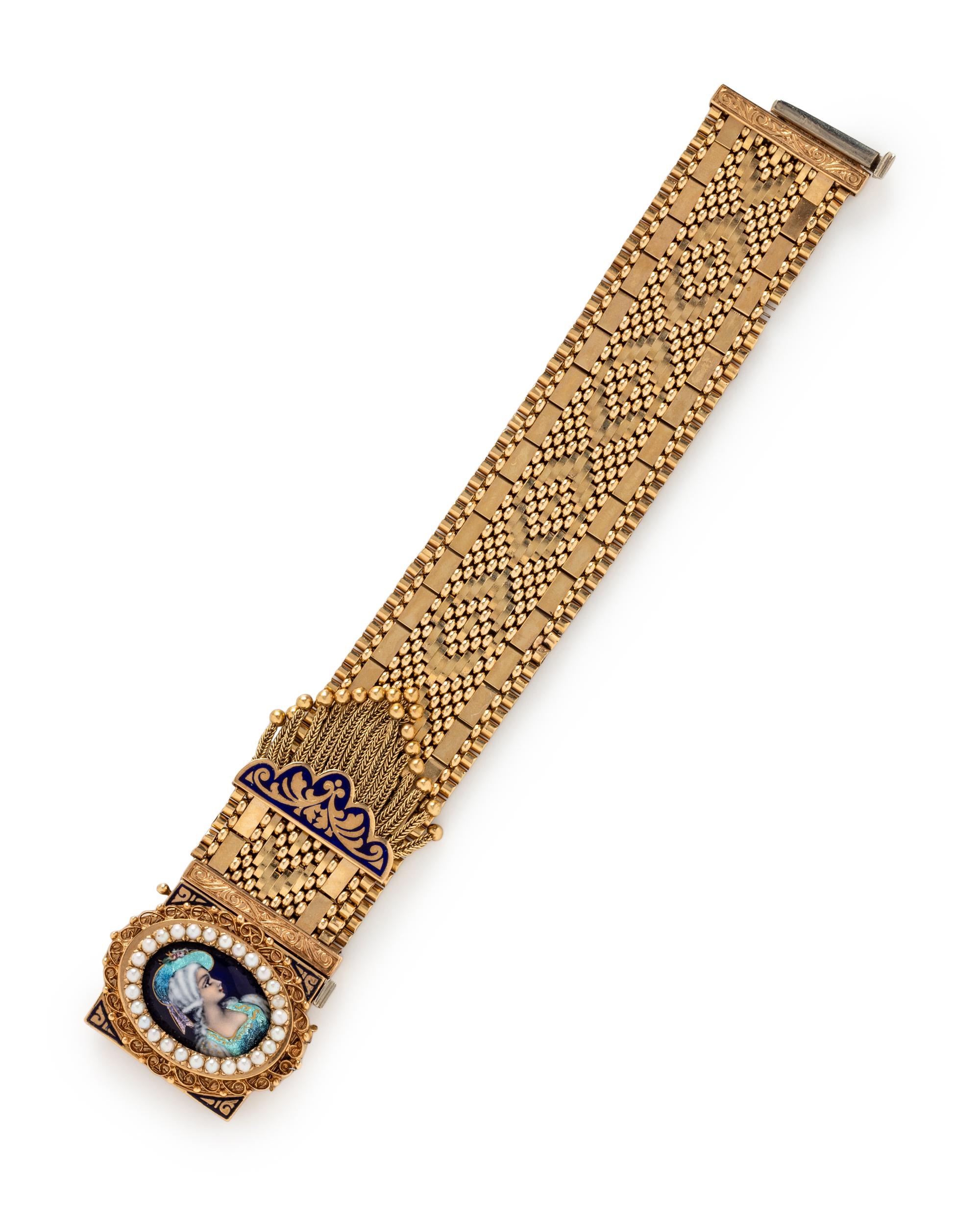 YELLOW GOLD, ENAMEL, AND SEED PEARL SURPRISE WATCH