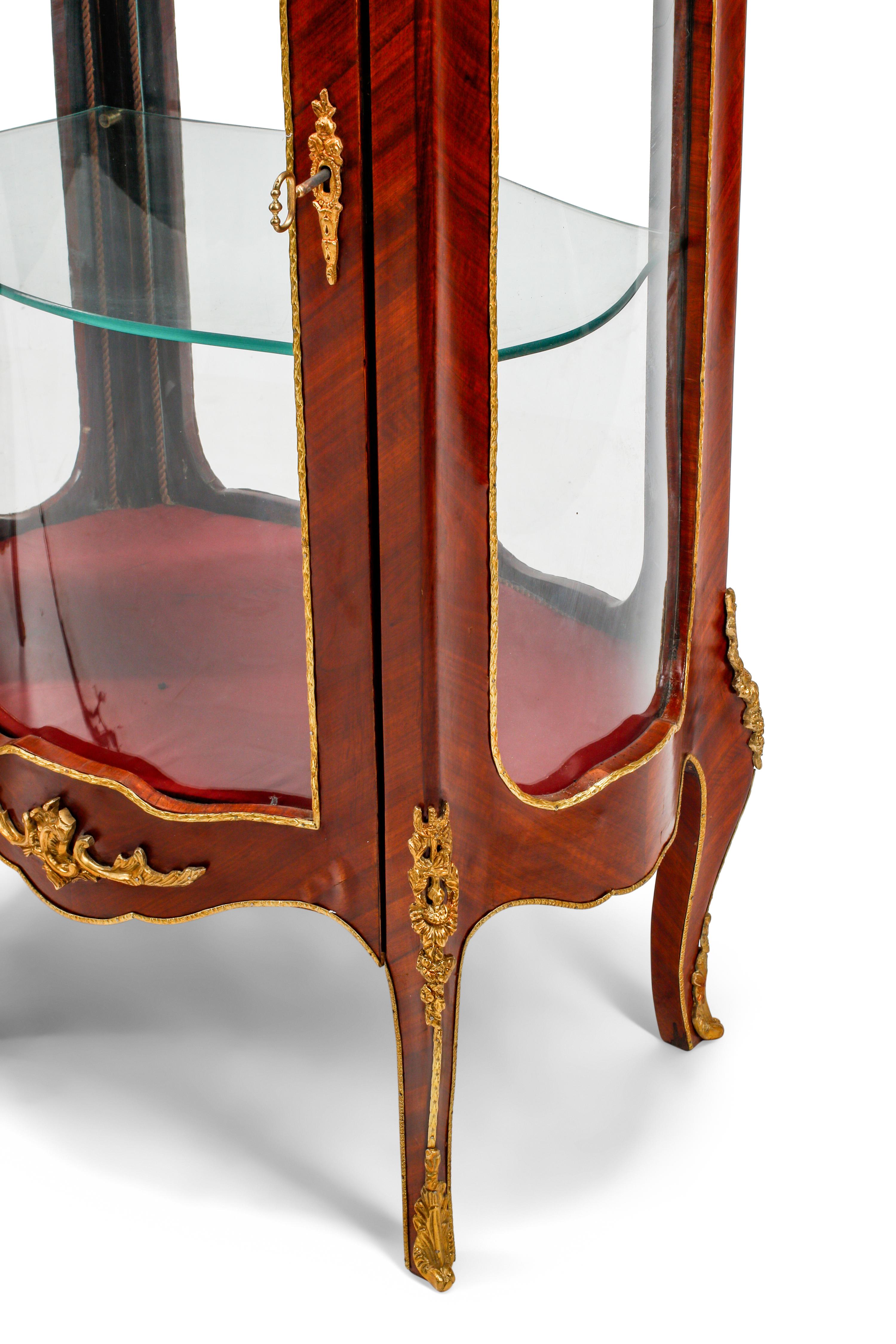 A Pair of Louis XV Style Marble-Top Vitrine Cabinets