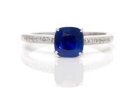 An 18 Karat White Gold, Sapphire and Diamond Ring, 1.80 dwts.