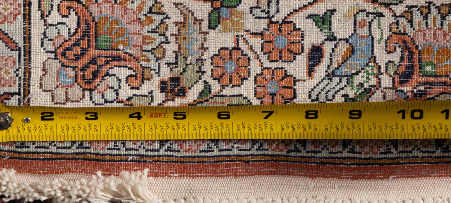 An Indo-Qom Silk Rug