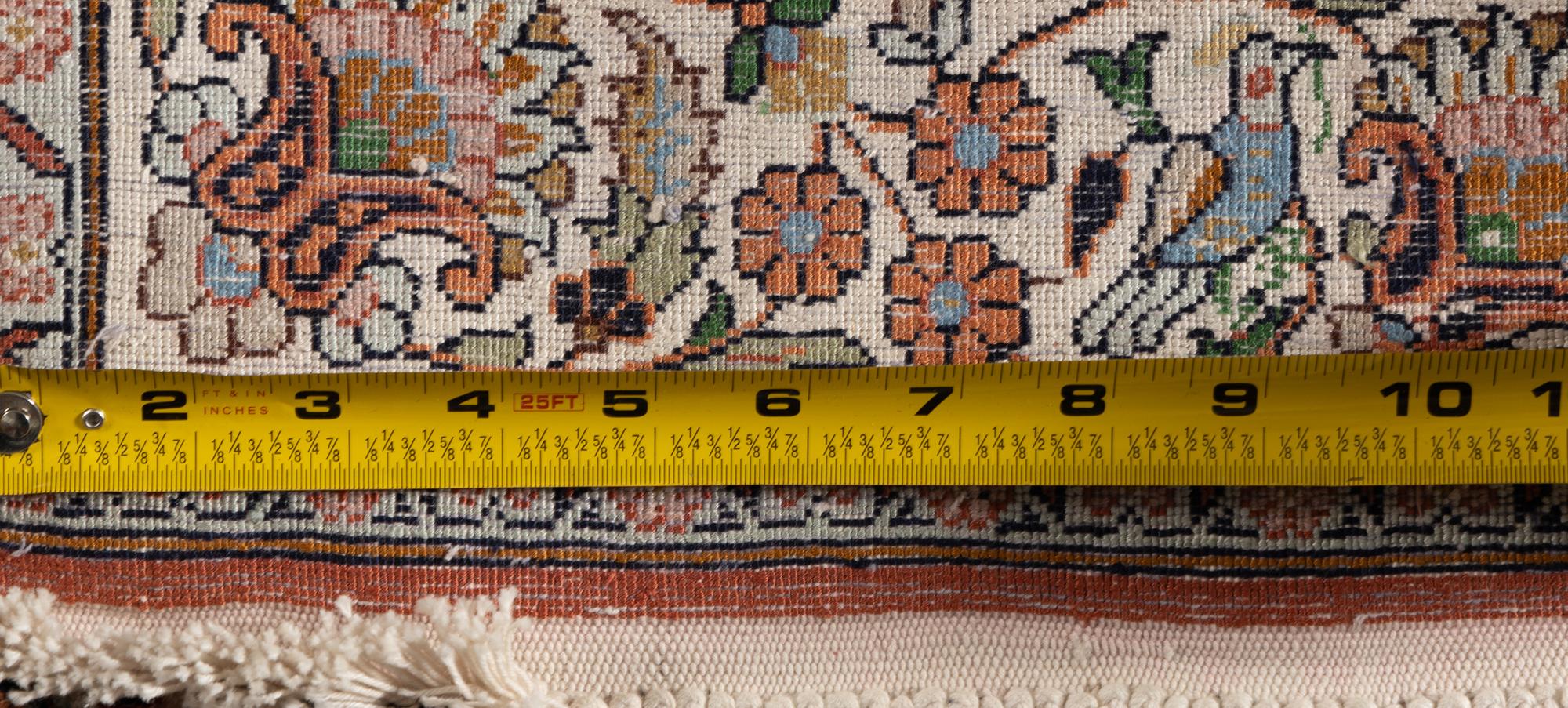 An Indo-Qom Silk Rug