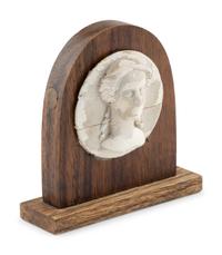 A White Painted Carved Wooden Portrait Relief of a Classical Female