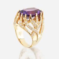 An amethyst, diamond, and gold ring