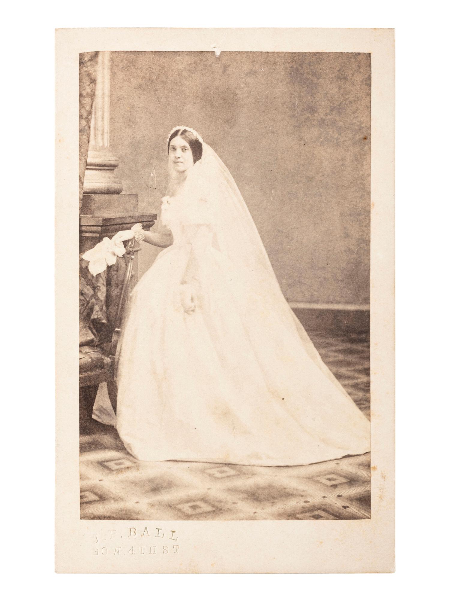 [AFRICAN AMERICANA - EARLY PHOTOGRAPHY]. BALL, James Presley (1825-1904), photographer. CDV of a young bride. [Cincinnati, OH], ca 1860-1870.