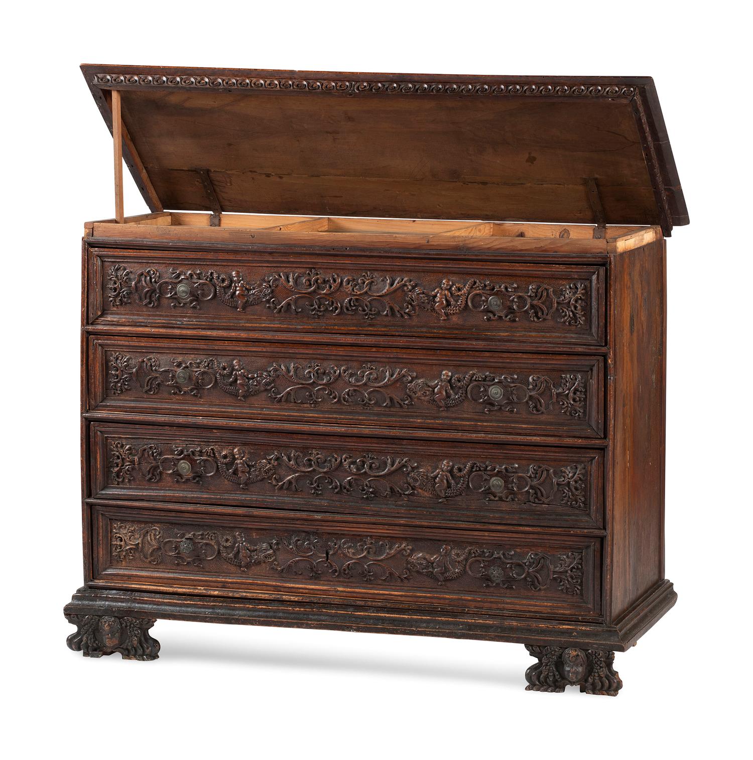 A Baroque Highly Carved Walnut Commode