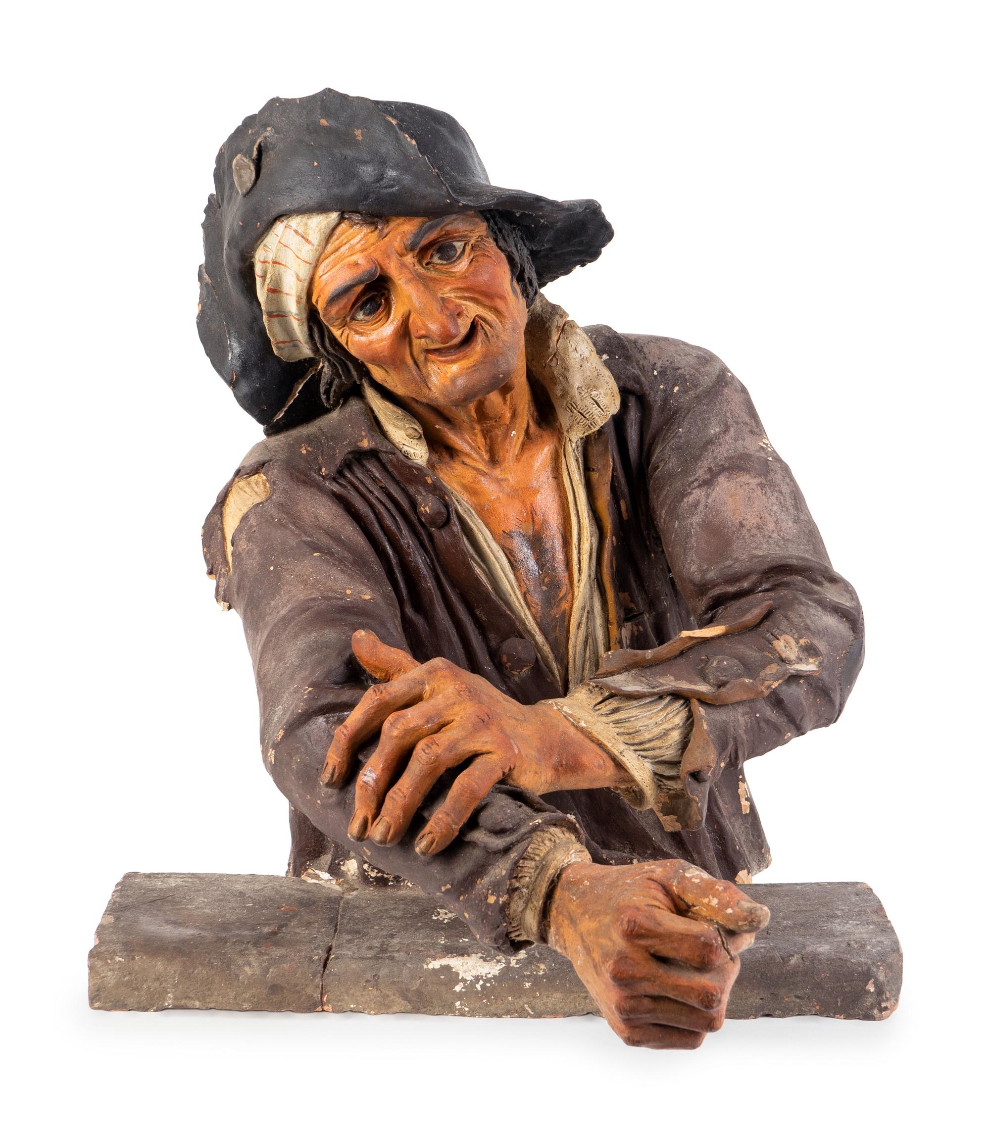 A French Polychromed Terracotta Bust of a Peasant