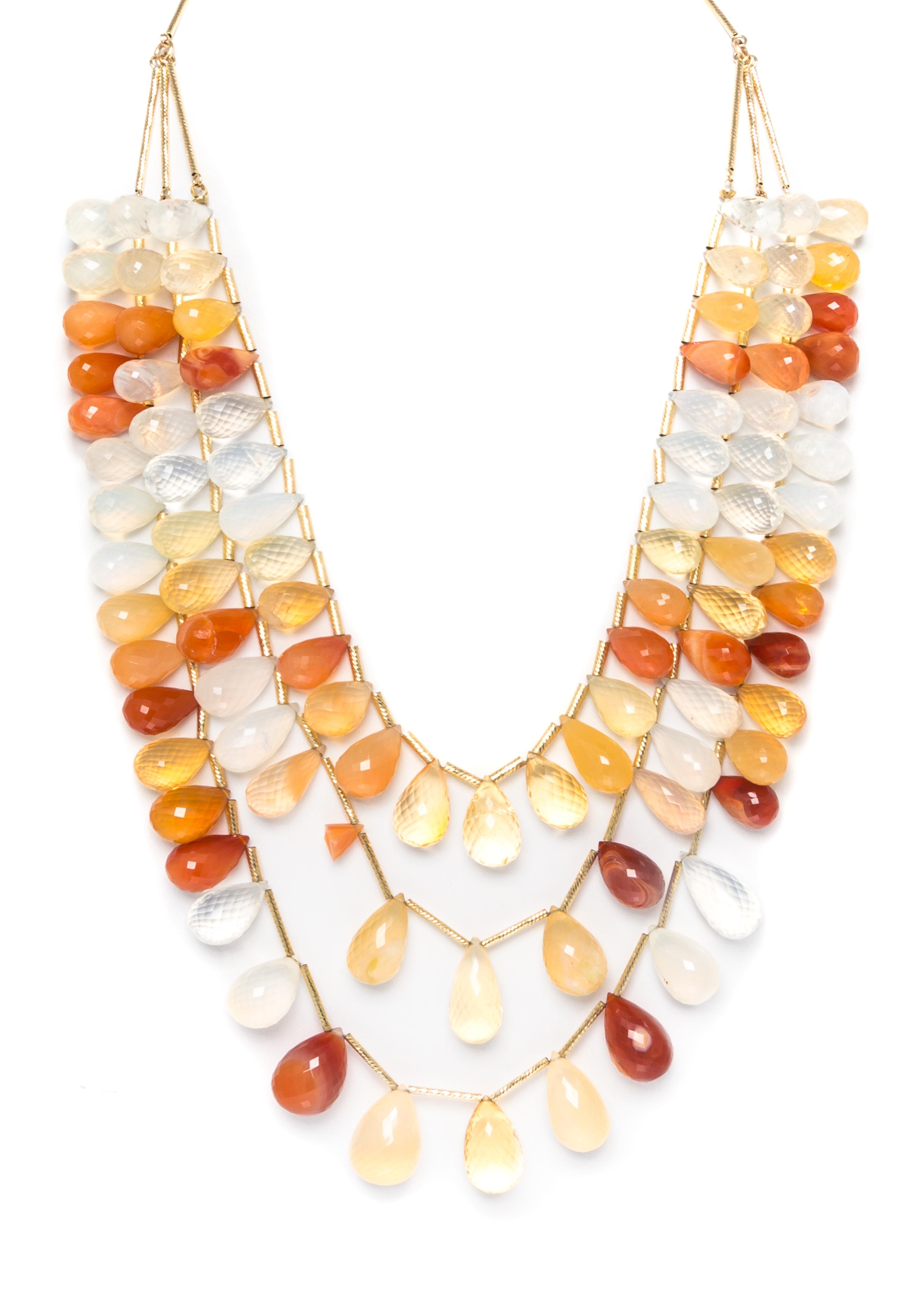 A Yellow Gold and Multi Strand Fire Opal Swag Necklace, 73.70 dwts.